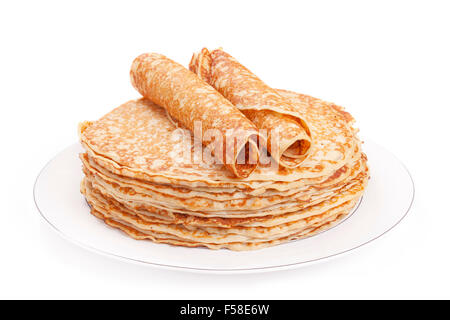 Ein Stapel von holländische Pfannkuchen auf einem Teller, isoliert auf einem weißen Hintergrund. Stockfoto
