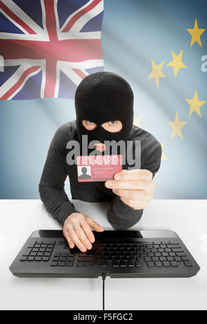 Hacker mit ID-Karte in der Hand und Flagge auf Hintergrund - Tuvalu Stockfoto