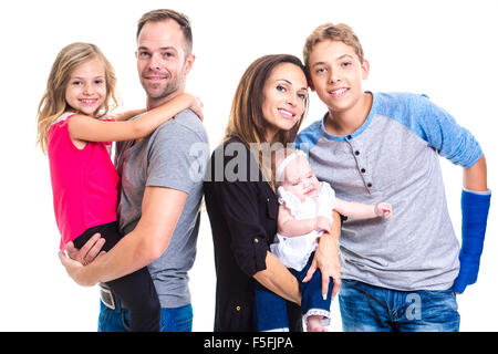 schöne Familie auf weißen Studio-Hintergrund Stockfoto