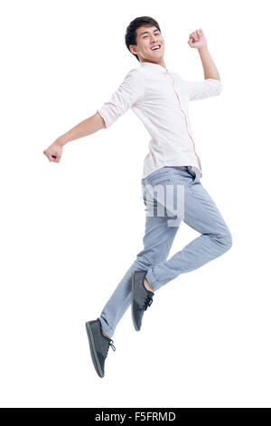 Junger Mann springen Stockfoto