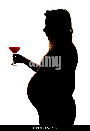 Schwangere Frauen rote Wein Silhouette Ausschnitt betrachten Stockfoto