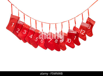 Advent-Kalender. Roter Weihnachts-Strumpf isoliert auf weißem Hintergrund. Stockfoto