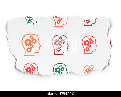 Informationskonzept: Kopf mit Gears Symbole auf Papier zerrissen Hintergrund Stockfoto