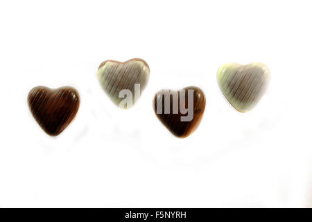 Leckere Pralinen Nahaufnahme auf weißem Hintergrund fotografiert Stockfoto