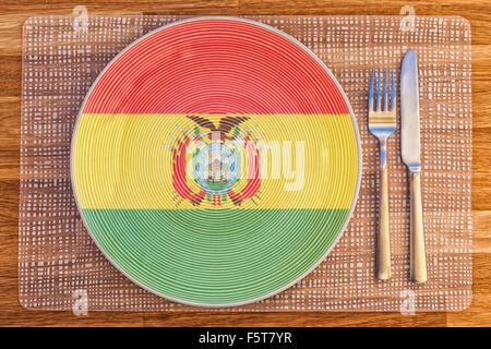 Teller mit der Flagge von Bolivien auf es für Ihre internationale Speisen und Getränke-Konzepte. Stockfoto