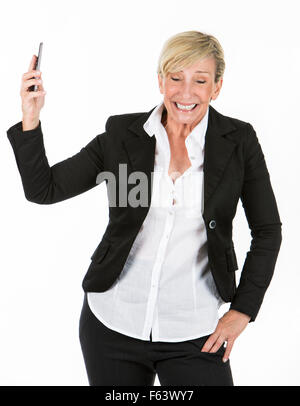 mittleren Alters Manager Frau mit einem Mobiltelefon Stockfoto