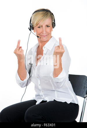 Manager-Frau mit den Headsets Midle Finger tun Stockfoto