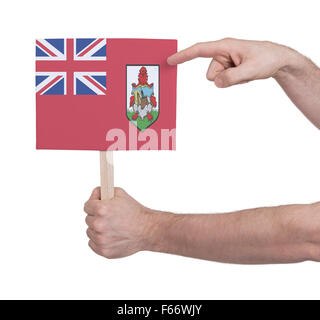 Hand, die kleine Karte, isoliert auf weiss - Flagge von Bermuda Stockfoto