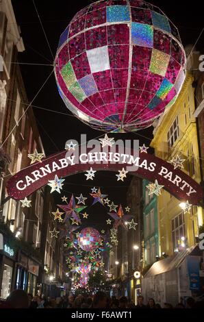 2015 Weihnachtsbeleuchtung auf der Carnaby Street, London, England, UK Stockfoto