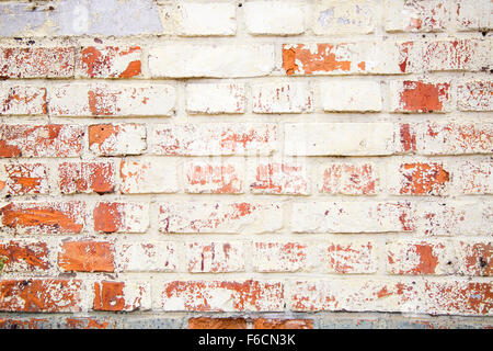 Hintergrund der alten Vintage verschmutzte Ziegelwand mit peeling Putz, Textur Stockfoto