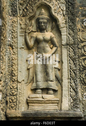 Angkor, Kambodscha: Angkor, Kambodscha: Bas-Reliefs von einem gesagt (Gottheit) in Ta Prohm Tempel aus Stein. Stockfoto