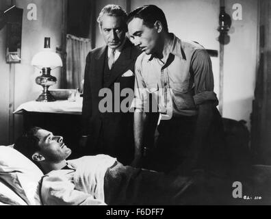 Datum der Freigabe: 20. Februar 1937. FILMTITEL: grünes Licht. STUDIO: Warner Bros. Bilder PLOT: Dr. Newell Paige ist eine dedizierte Chirurg und Arzt, widmet sich seiner Patienten und die Ethik von seinem Beruf. Abdeckung für sein Mentor, Dr. Endicott, die von persönlichen Problemen konsumiert wird, ist Paige reichen Spender ins Krankenhaus, Frau Dexter tätig. Jedoch stürzt Dr. Endicott im letzten Moment und in seiner Eile Murks die Operation. Frau Dexter stirbt. Eine Anfrage erfolgt. Im Bild: ERROL FLYNN als Dr. Newell Paige, WALTER ABEL als Arzt John Stafford und HENRY O'NEILL als Dr. Endicott Stockfoto