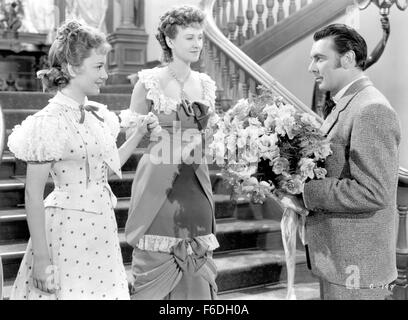 Datum der Freigabe: 12. Februar 1938. FILMTITEL: Gold ist, wo Sie finden It. STUDIO: Warner Bros Pictures. PLOT:. Im Bild: GEORGE BRENT als Jared Whitney und OLIVIA DE HAVILLAND als Serena "Sprotte" Ferris. Stockfoto