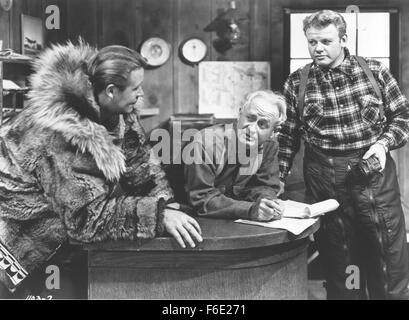 Datum der Freigabe: 19. Oktober 1952. FILMTITEL: Arktische Flug. STUDIO: Monogram Pictures. PLOT: Mike Wein, ein Alaskan Bush Pilot Betrieb der Bering Seegebiet, freundet sich mit John W. Wetherby, posieren als Reichtum Vereinigten Staaten Geschäftsmann. Aber in Wirklichkeit ist er ein russischer Spion auf dem Weg nach Sibirien tragenden Mikrofilme von den Vereinigten Staaten Verteidigung-Installationen. Im Bild: WAYNE MORRIS als Mike Wein. Stockfoto