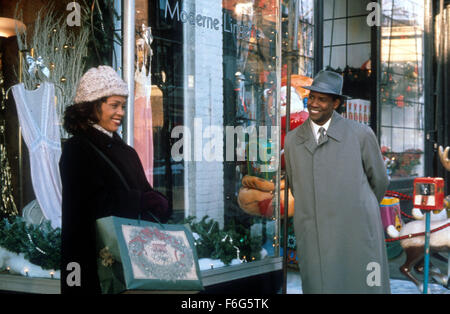 Datum der Freigabe: 13. Dezember 1996. FILMTITEL: Der Prediger Frau. STUDIO: Touchstone Pictures. PLOT: Gut gelaunt Reverend Henry Biggs feststellt, dass seine Ehe mit Chor Herrin Julia kennzeichnen ist, wegen seiner ständigen Abwesenheit Betreuung von sozial benachteiligten Stadtteil, in der sie leben. Darüber hinaus kommt seiner Kirche unter Drohung von Bauträger Joe Hamilton. In ihrer Verzweiflung Pfr. Biggs betet zu Gott um Hilfe - und Hilfe kommt in Form von einem Engel namens Dudley. Dudleys Ankunft scheint jedoch noch mehr Ärger. Im Bild: WHITNEY HOUSTON als Julia Biggs und DENZEL WASHINGTON als Stockfoto