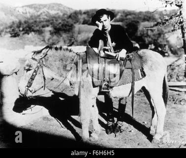 1930, Filmtitel: TEXANER, Regie: JOHN CROMWELL, Studio: PARAMOUNT, abgebildet: BURRO, Kleidung, GARY COOPER, JOHN CROMWELL. (Bild Kredit: SNAP) Stockfoto