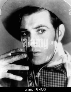 1930, Filmtitel: TEXANER, Regie: JOHN CROMWELL, Studio: PARAMOUNT, abgebildet: Zubehör, Zigarette, GARY COOPER, COWBOY, JOHN CROMWELL, Hut, Raucher. (Bild Kredit: SNAP) Stockfoto