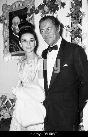 1964, Filmtitel: MY FAIR LADY, Regie: GEORGE CUKOR, Studio: WARNER, abgebildet: REX HARRISON, AUDREY HEPBURN, Smoking. (Bild Kredit: SNAP) Stockfoto