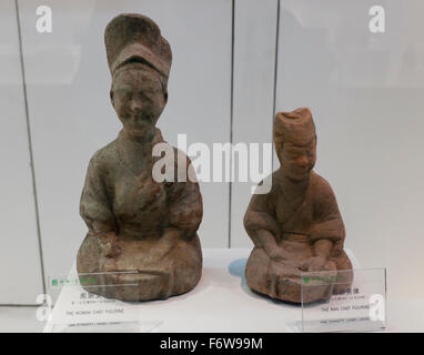 Keramik Figuren Darstellung Köche aus der Han-Zeit angezeigt (206BC).-220AD) im Museum der Sichuan-Küche in Chengdu. Stockfoto