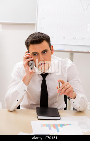 Manager arbeitet im Büro. Stockfoto