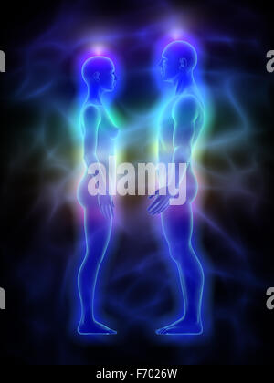 Frau und Mann mit Aura, Chakren und heilende Energie Stockfoto