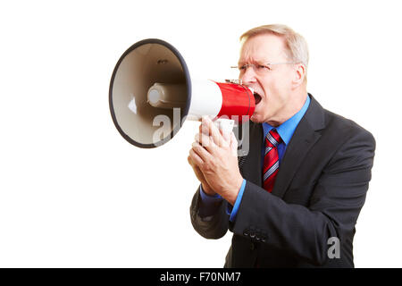 Leitenden Geschäftsmann laut zu schreien, in einem großen Megaphon Stockfoto