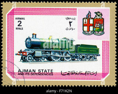 AJMAN STATE - ca. 1972: Eine Briefmarke gedruckt in Vereinigte Arabische Emirate, zeigt Lokomotive, Serie, ca. 1972 Stockfoto