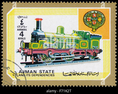 AJMAN STATE - ca. 1972: Eine Briefmarke gedruckt in Vereinigte Arabische Emirate, zeigt Lokomotive, Serie, ca. 1972 Stockfoto