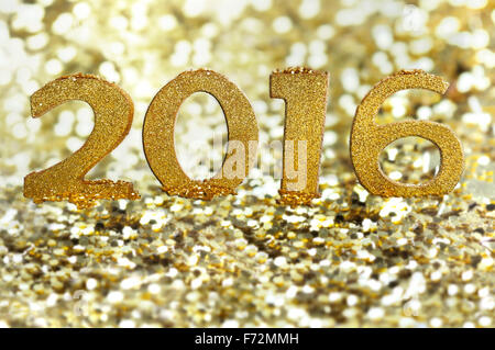 goldenen Figuren 2016 auf glänzenden Bokeh Hintergrund Stockfoto