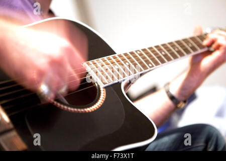 Gitarre-Player und Musik-Instrument-Konzept Stockfoto