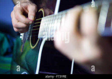 Gitarre-Player und Musik-Instrument-Konzept Stockfoto
