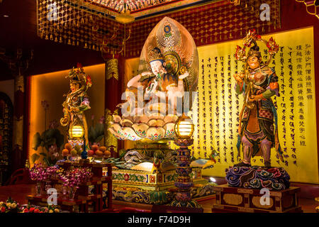 Lustige buddhistische Statuen in Singapur Stockfoto