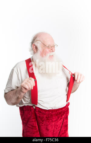 Ein lachender Weihnachtsmann in unter Hemd und roten Strapsen als He Kleider für Heiligabend Stockfoto