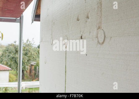 Gebäudedämmung - Closeup Fassade Polystyrol zu verankern. Stockfoto