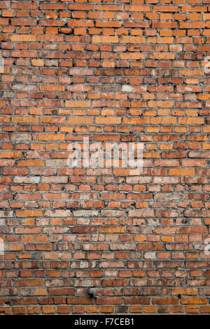 Die roten Backsteinmauer eines alten Hauses Stockfoto