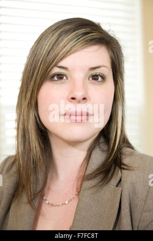 Beautiful Young Woman in Business Attire Stockfoto