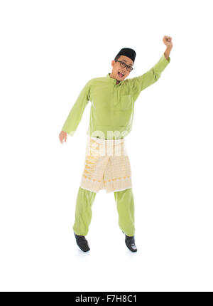 Malay männlichen springen in Freude Stockfoto