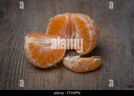 Geschälte Clementine Scheiben, orange Frucht. Stockfoto