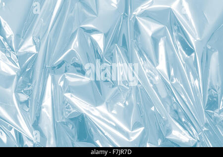 blau glänzenden metallischen Folie Hintergrund Stockfoto