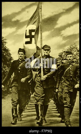 Deutsche Soldaten marschieren durch die Straßen von Warschau, die Nazi-Flagge. Polen ist captial eingedrungen war und 1939 an die Wehrmacht übergeben. Stockfoto