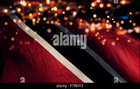 Trinidad und Tobago Nationalflagge heller Nacht Bokeh abstrakten Hintergrund Stockfoto