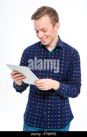 Porträt von ein lächelnder Mann mit Tablet-Computer auf einem weißen Hintergrund isoliert Stockfoto
