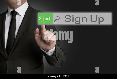 Sign-up Browser wird von Geschäftsmann Konzept betrieben. Stockfoto