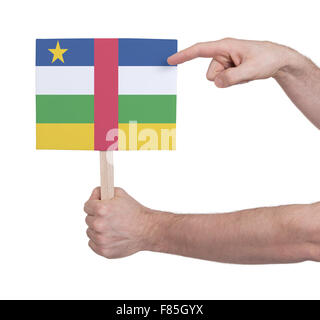 Hand, die kleine Karte, isoliert auf weiss - Flagge der Zentralafrikanischen Republik Stockfoto