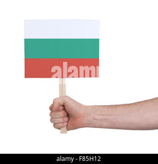 Hand, die kleine Karte, isoliert auf weiss - Flagge von Bulgarien Stockfoto