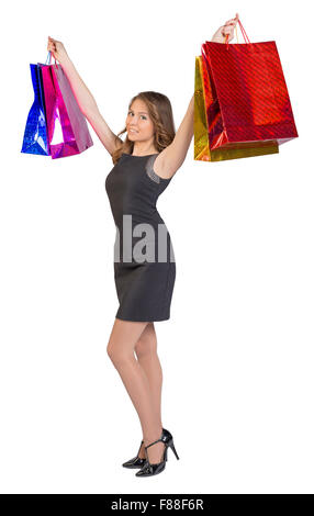 Frau mit Taschen einkaufen, isoliert auf weißem Studio-Hintergrund Stockfoto
