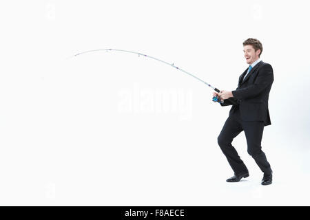 Textfreiraum mit Geschäftsmann in einer Fischerei-Figur Stockfoto