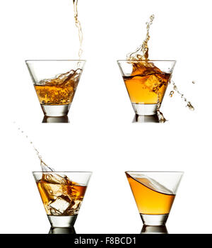 Schuss Whisky mit Eis isoliert auf weiss Stockfoto
