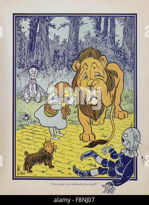 DER wunderbare Zauberer von OZ Dorothy trifft den feigen Löwen gezogen für die erste Ausgabe im Jahr 1900 das Buch von Frank Baum von William Denslow. Stockfoto