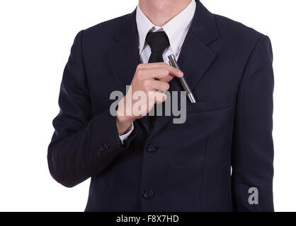 Geschäftsmann Kommissionierung einen Stift aus der Tasche isoliert auf weißem Hintergrund Stockfoto